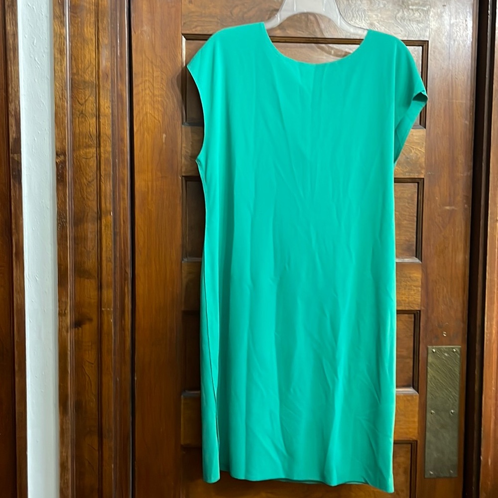 Light weight green dress made flowey and back drapes fun